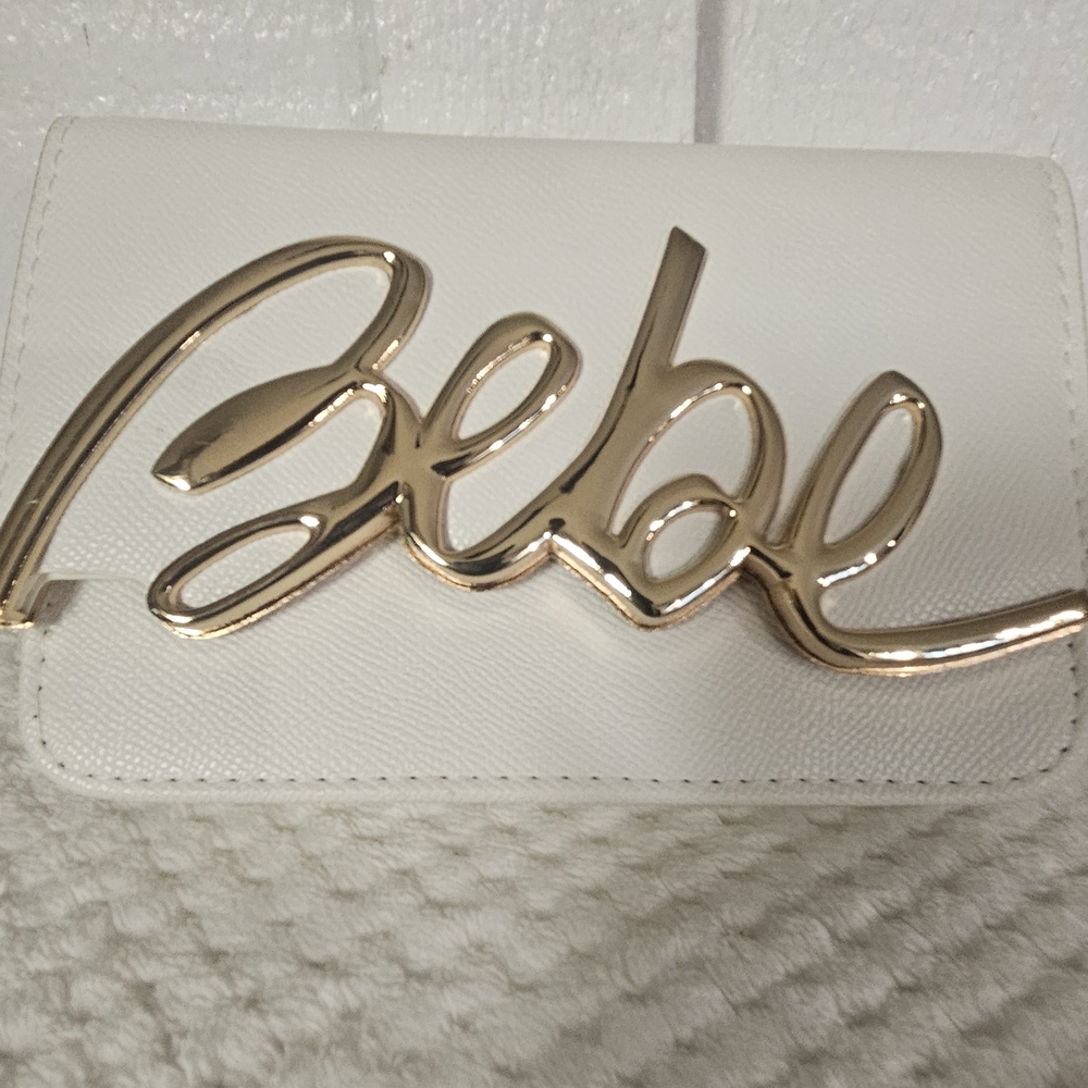 Bebe Gold and White Clutch
